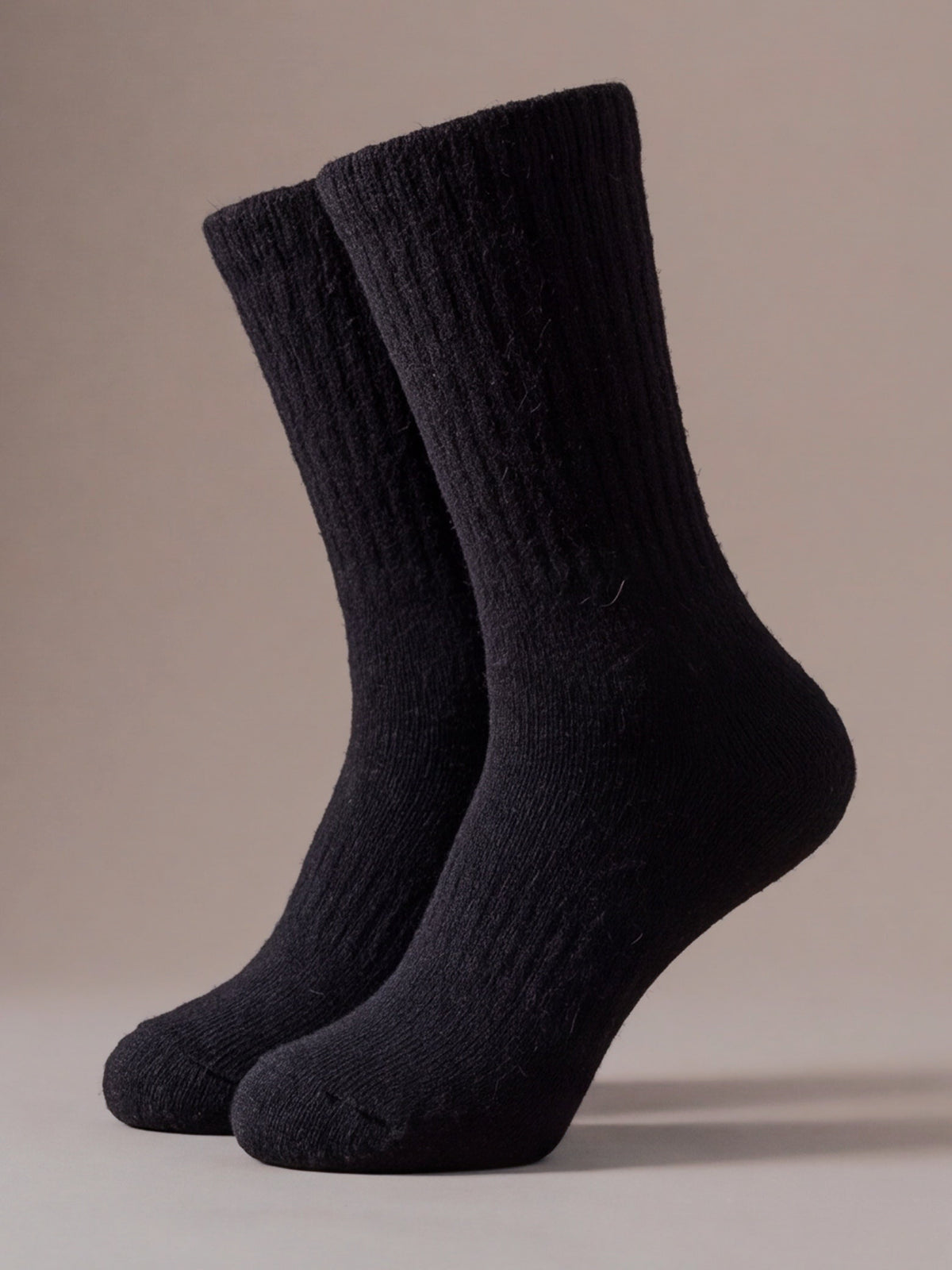 The Cabin Sock in black, chunky knit, studio