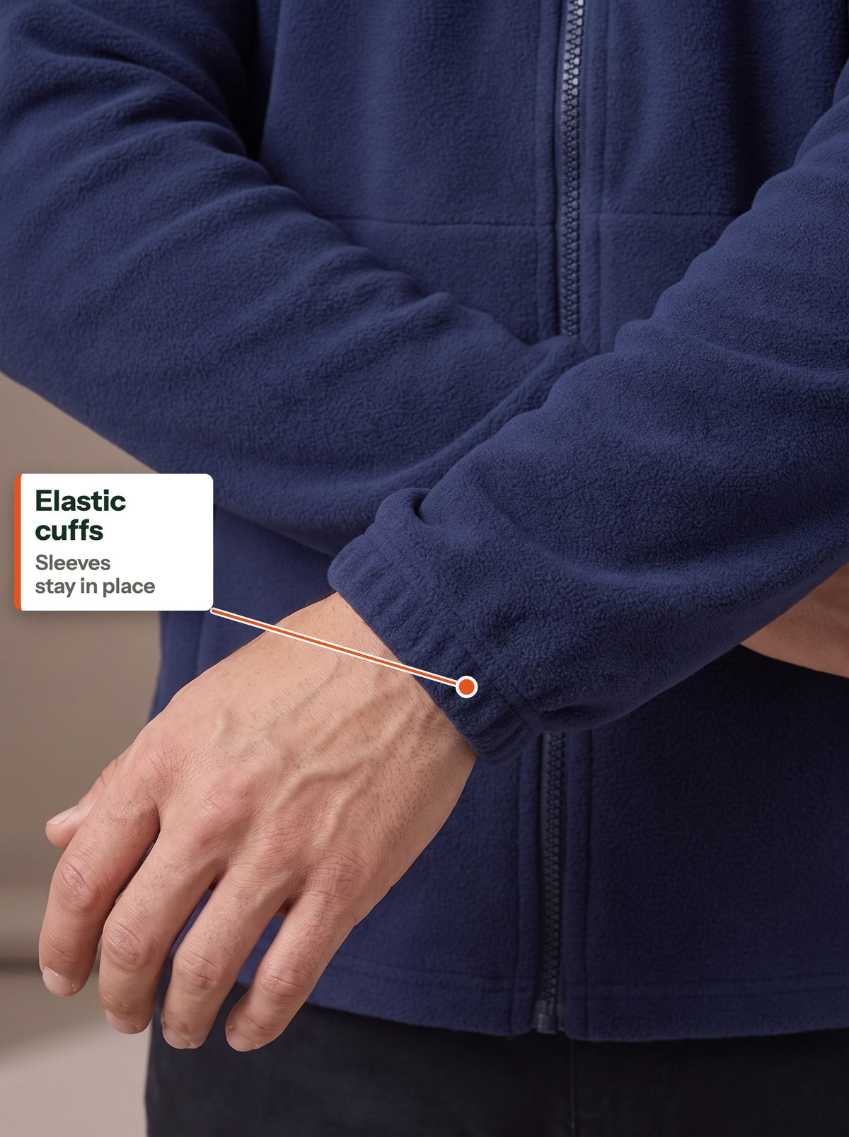 Elastic cuff of the navy fleece jacket at the wrist (EN label)