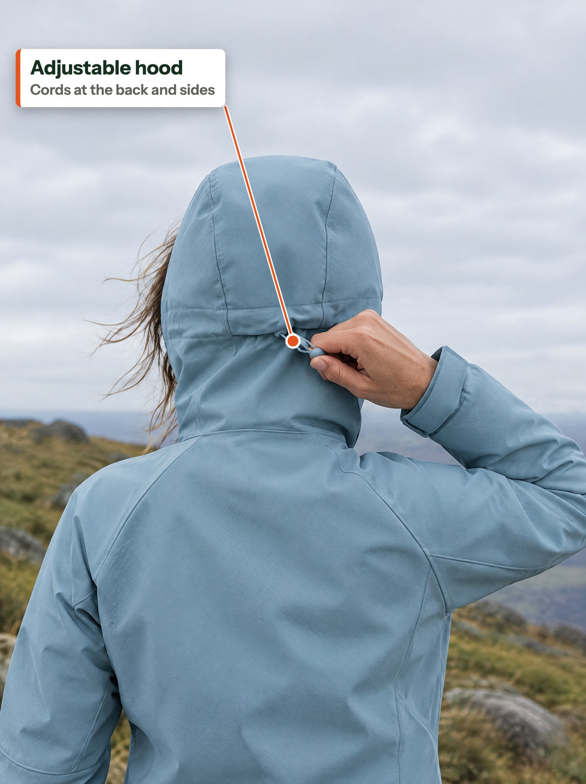 Hood cord at the back being tightened (EN label)