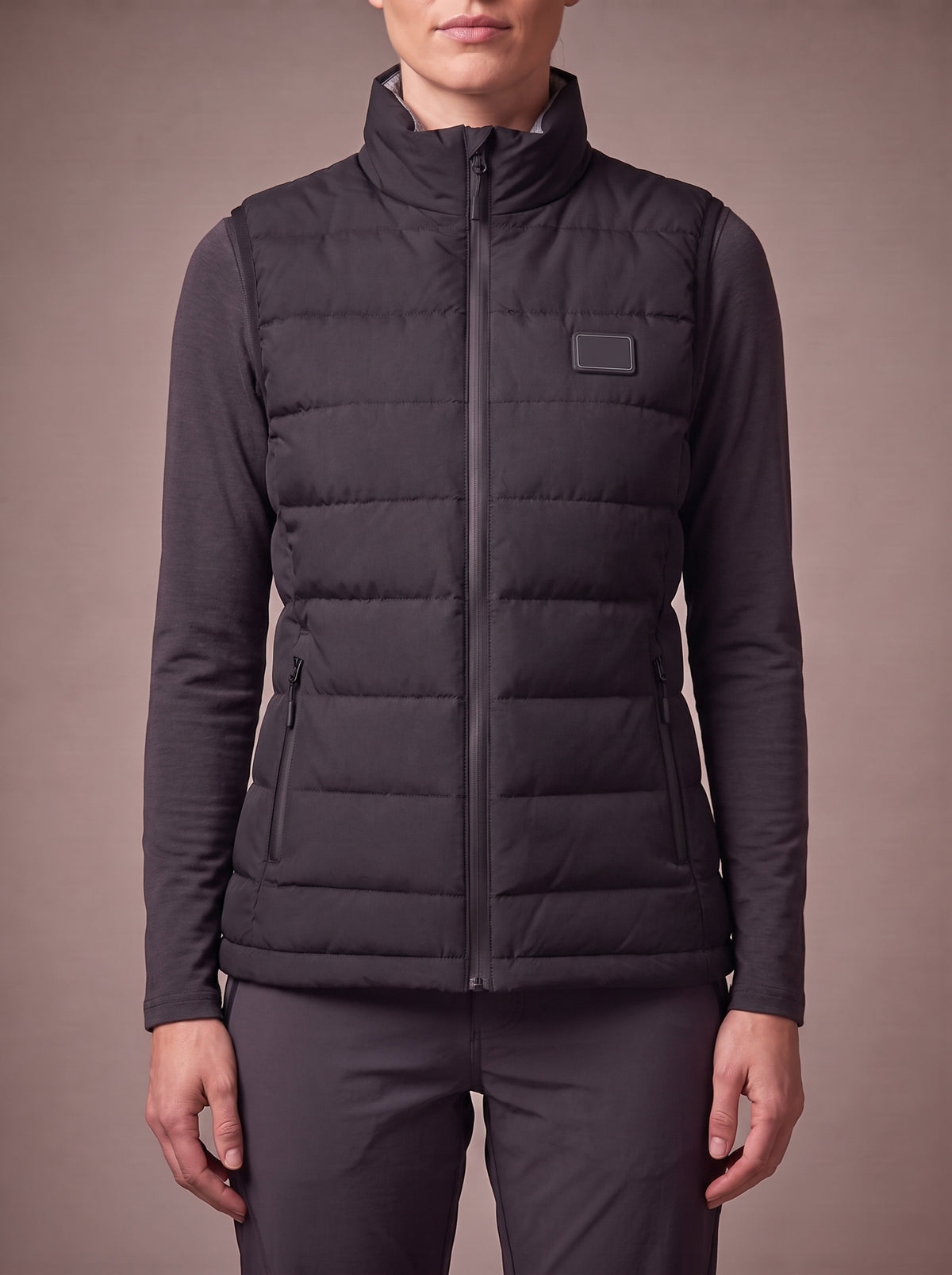 The HeatCore Bodywarmer Women in black, studio, front