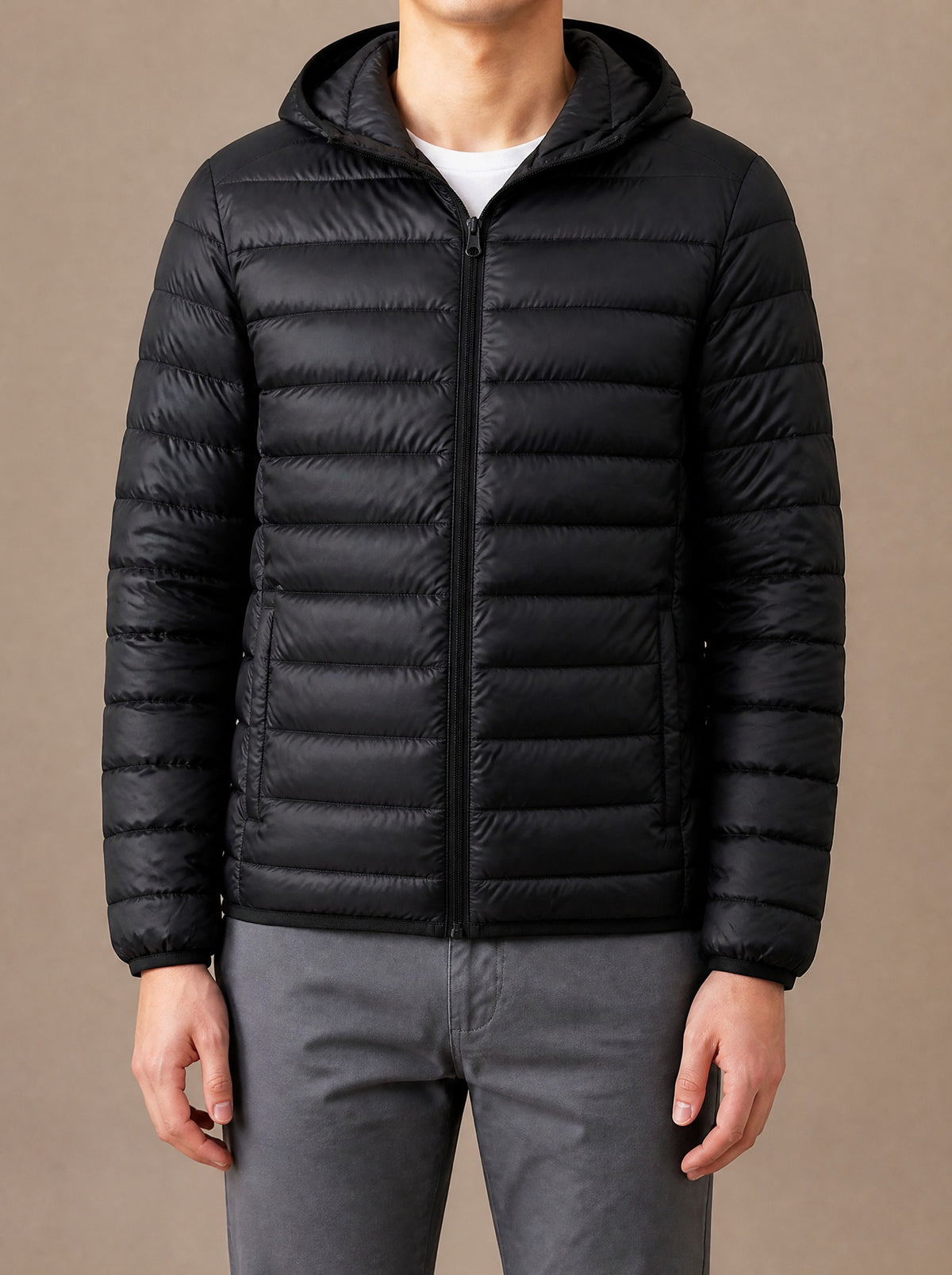Black hooded packable down jacket for men, studio view