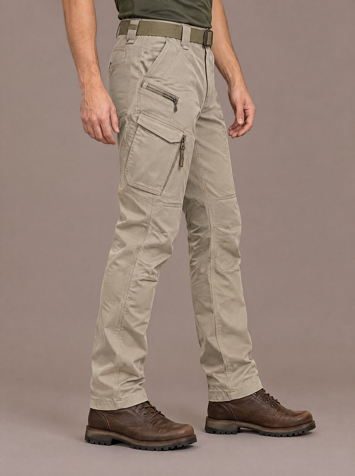 Men's khaki stretch cotton cargo trousers with zipped thigh pockets, studio view