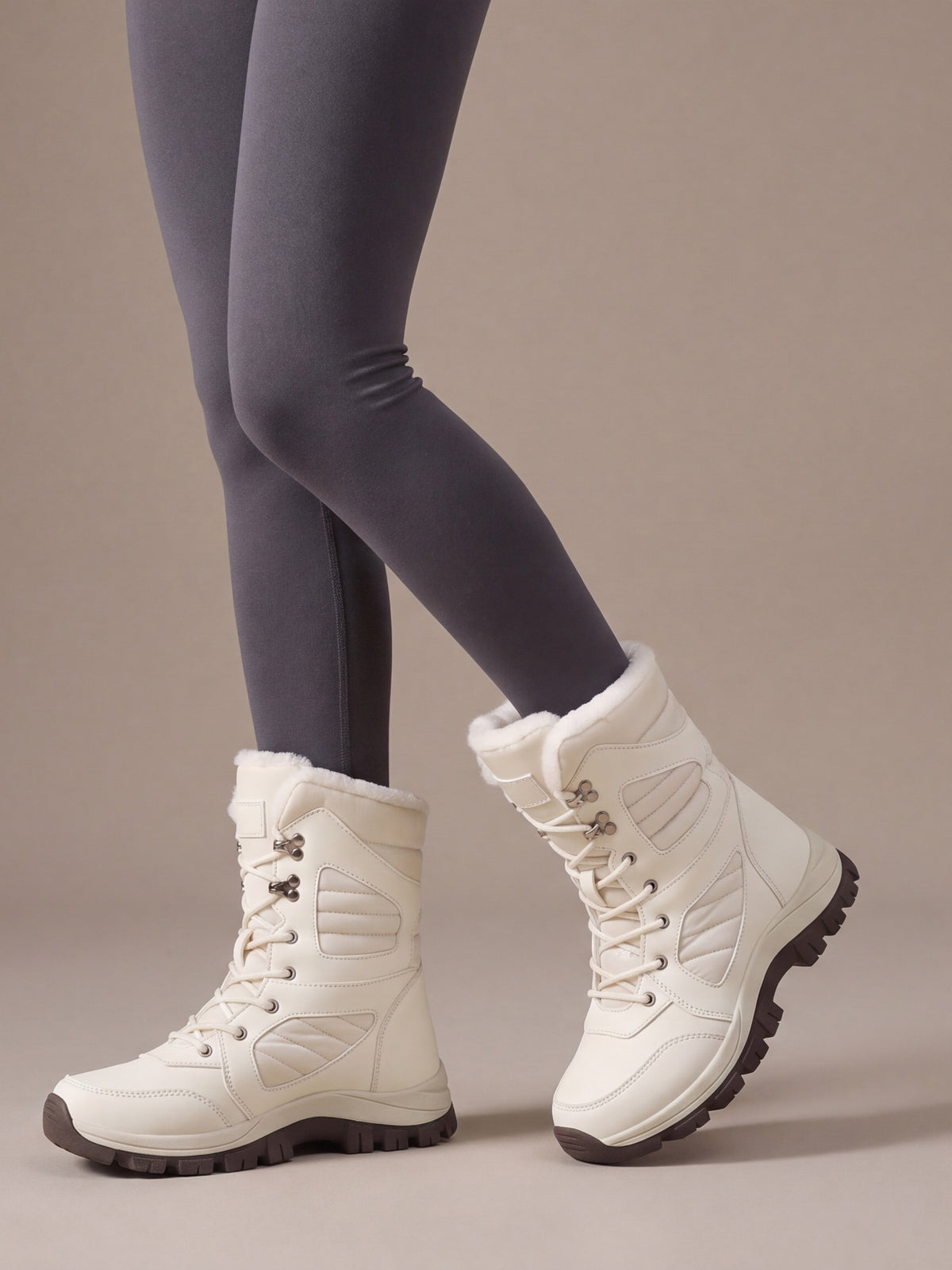 The Trail Snow Boot Women in Cream, worn, studio view