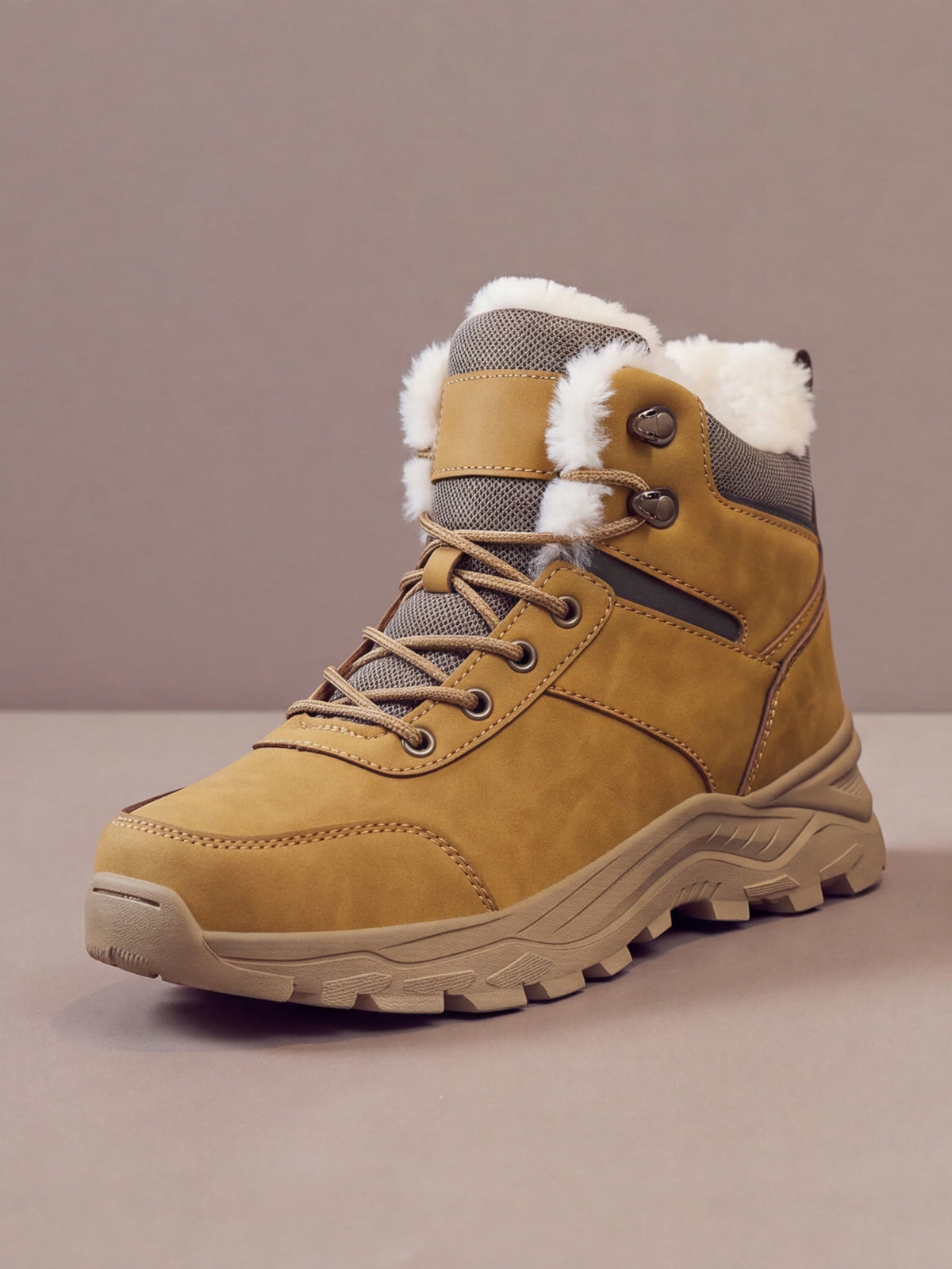 The Winter Trail Boot in tan, lace-up winter hiking boot with plush collar, studio