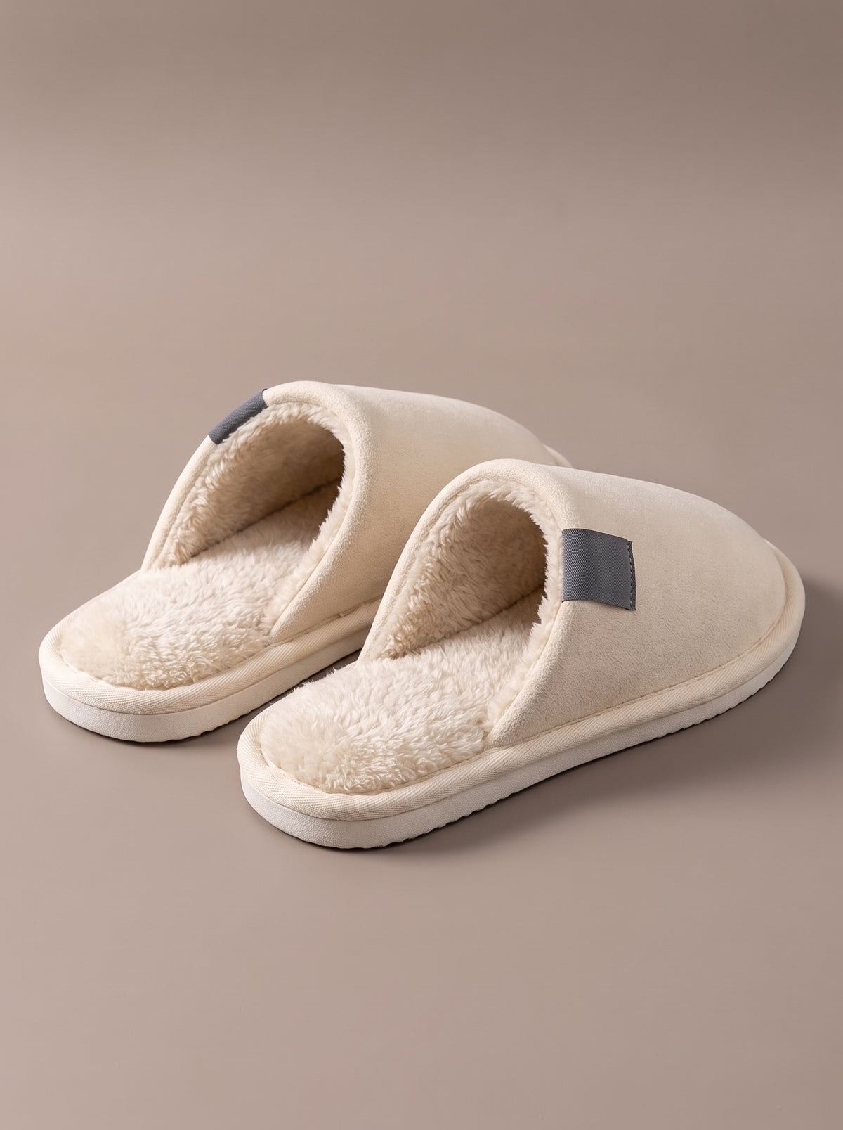 Women's After Hike Slipper in cream, seen from behind with the plush lining