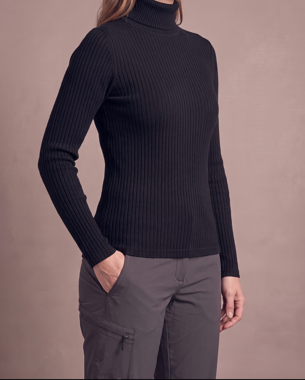 Women's black lined roll-neck, side view