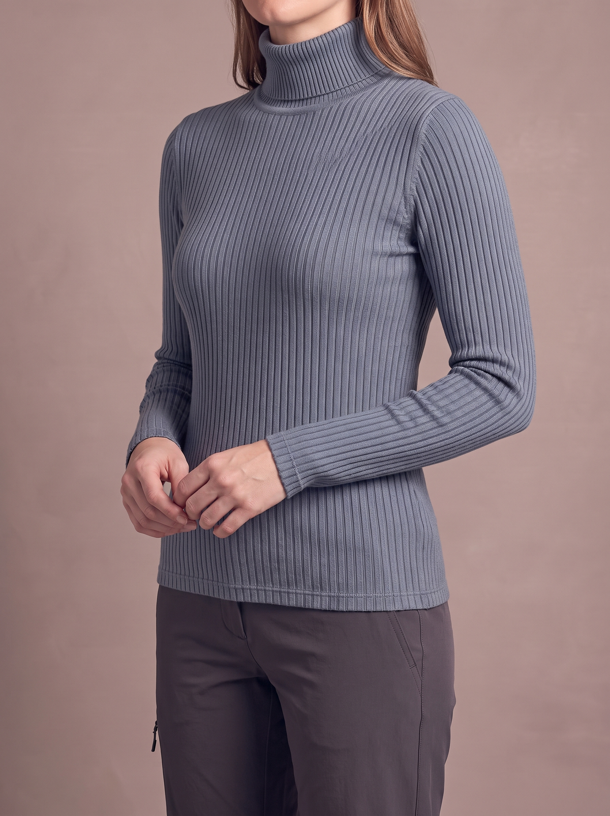 Women's blue grey lined roll-neck, hands together