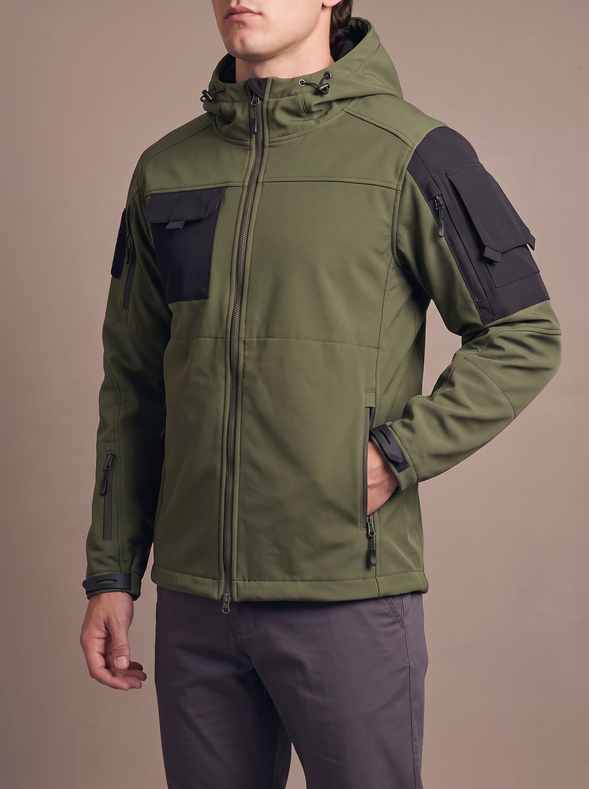 Men's Combat Softshell in olive with black chest and sleeve pocket panels, studio view