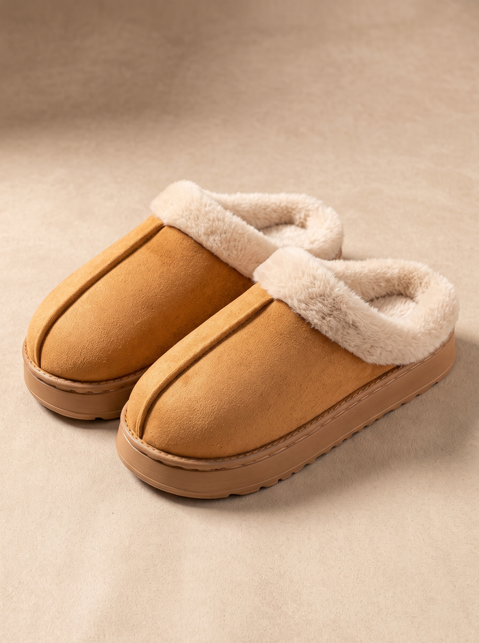 Pair of tan home slippers with a suede-look upper and cream plush collar