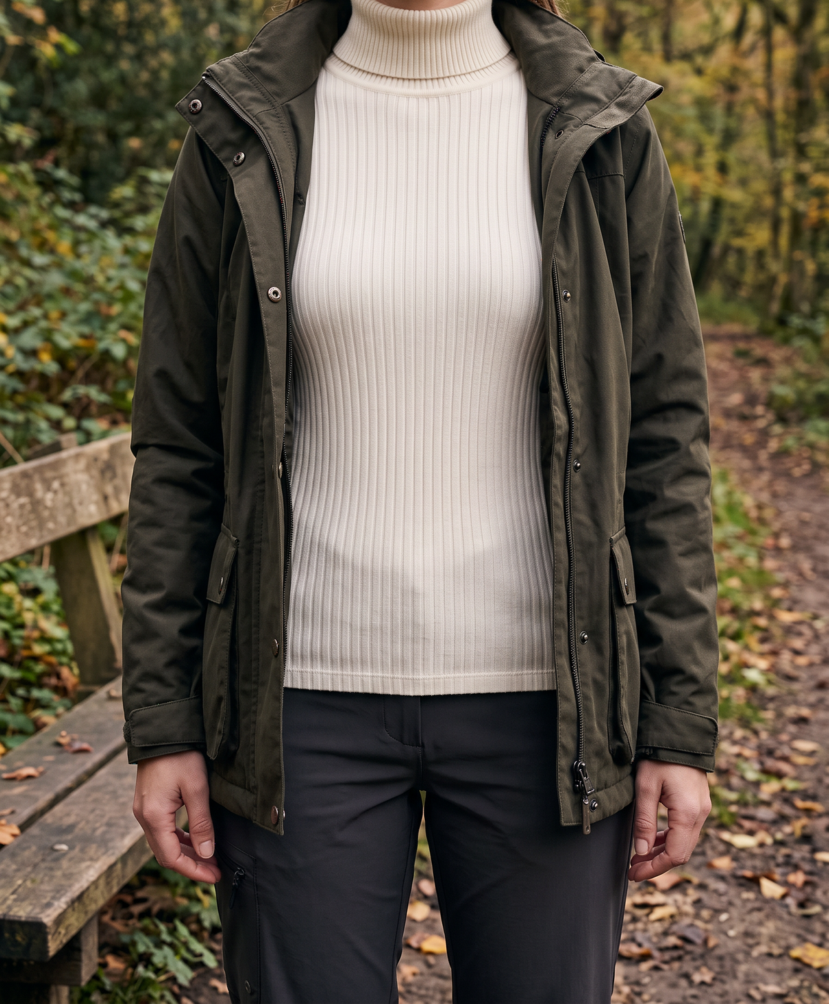 Cream roll-neck under an open jacket on an autumn trail