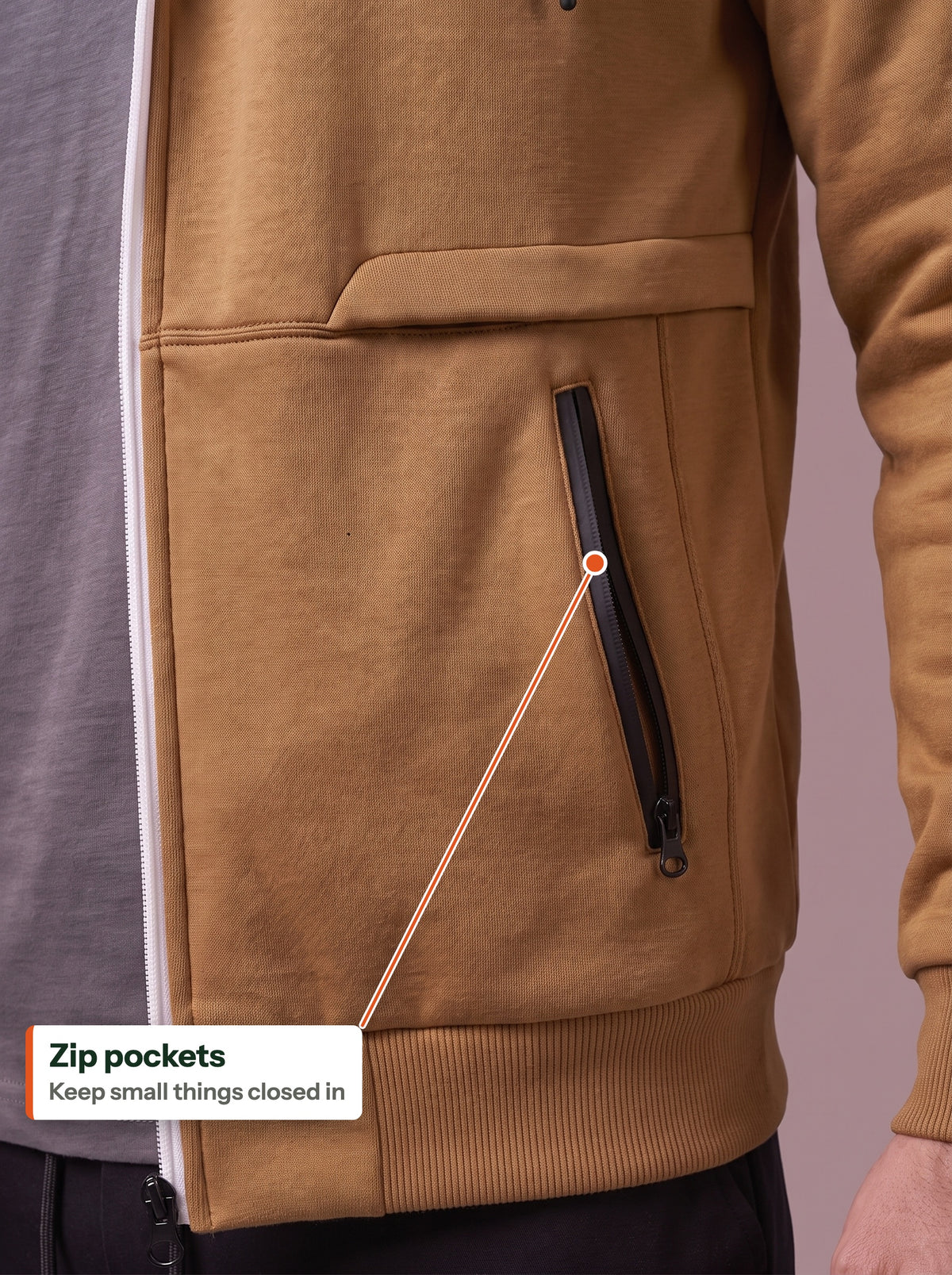 Zip pocket on the camel zip hoodie