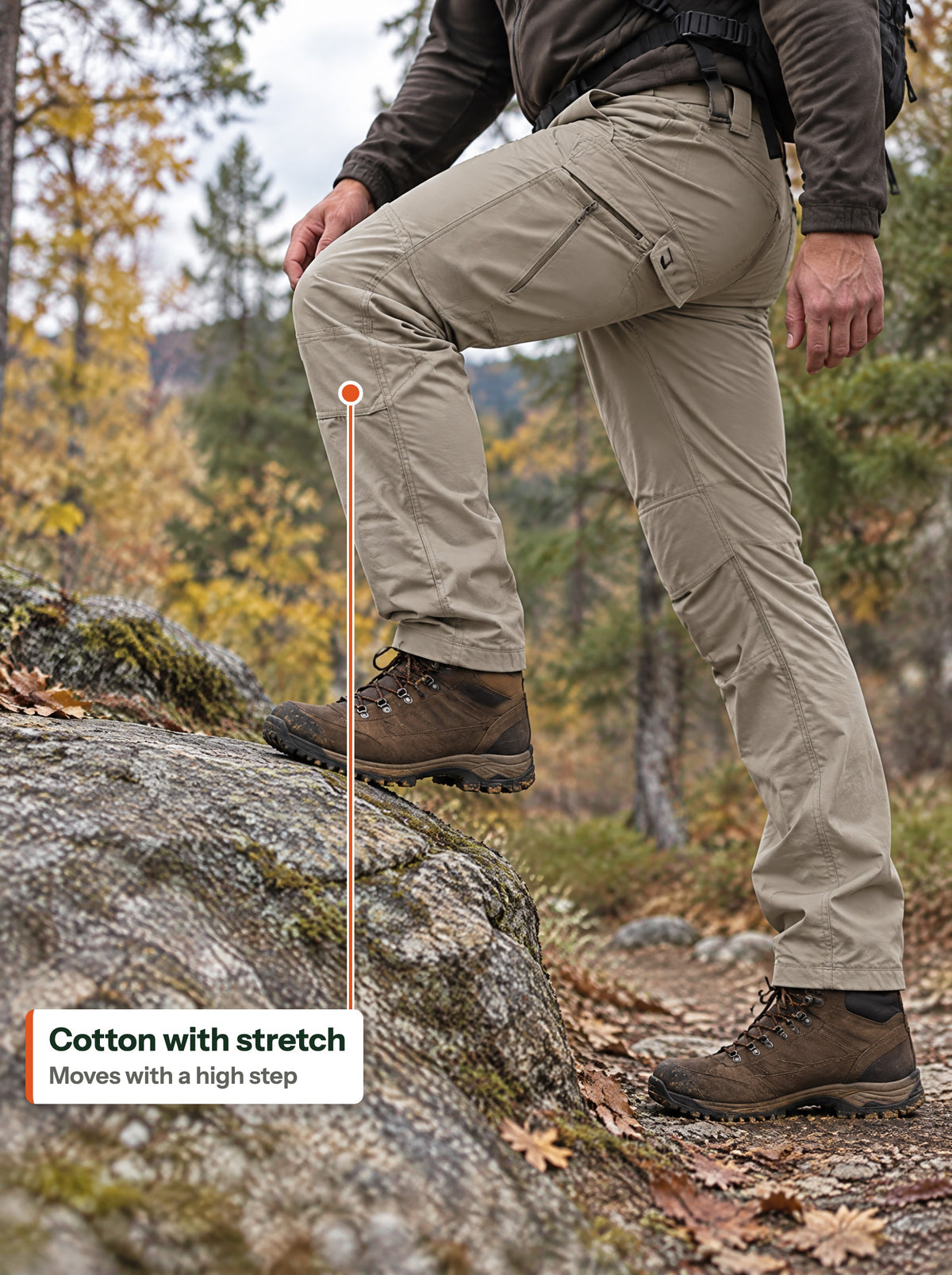High step onto a rock in cotton stretch cargo trousers (EN label)