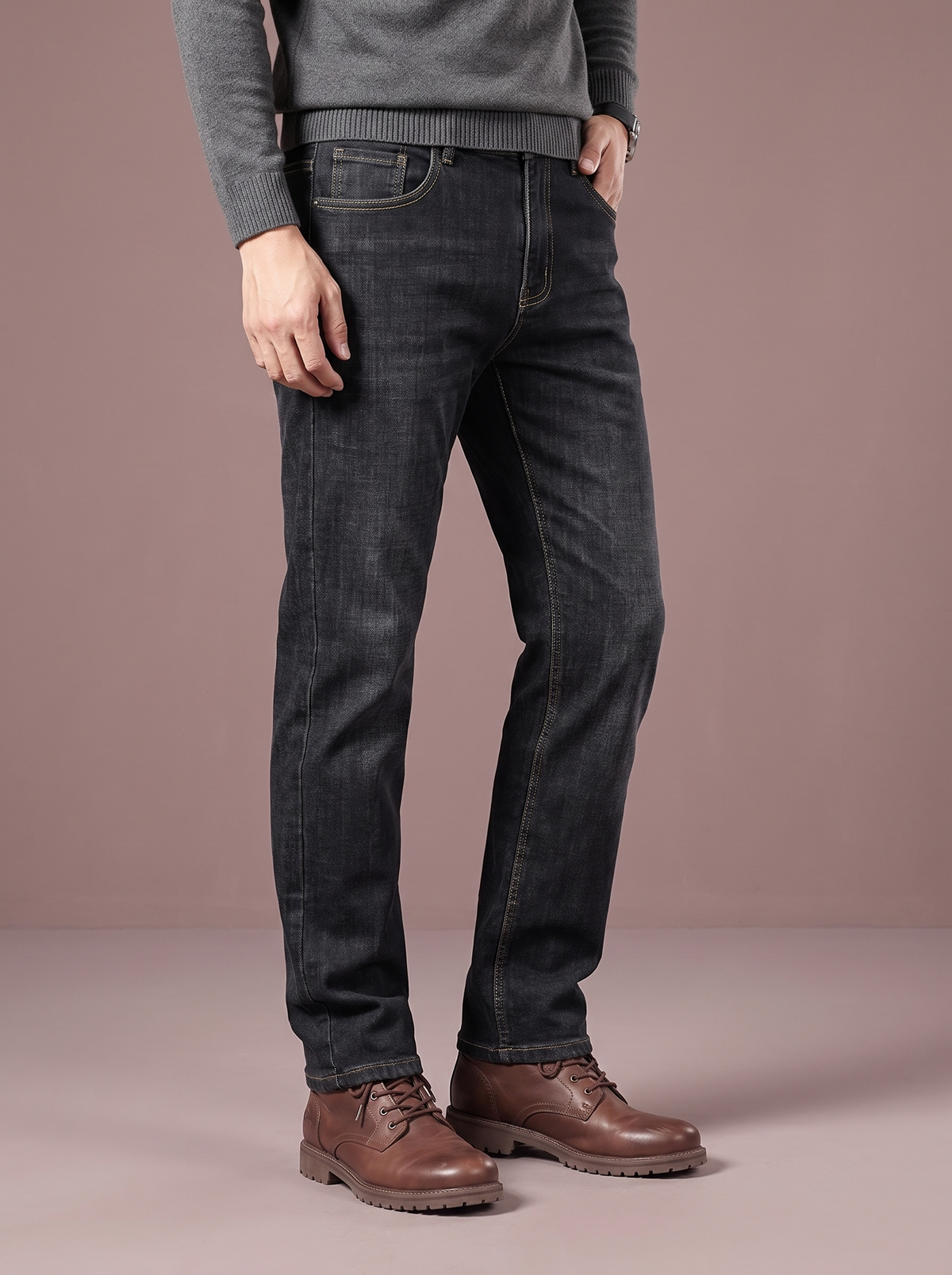 Men's black plush lined jeans, three-quarter view