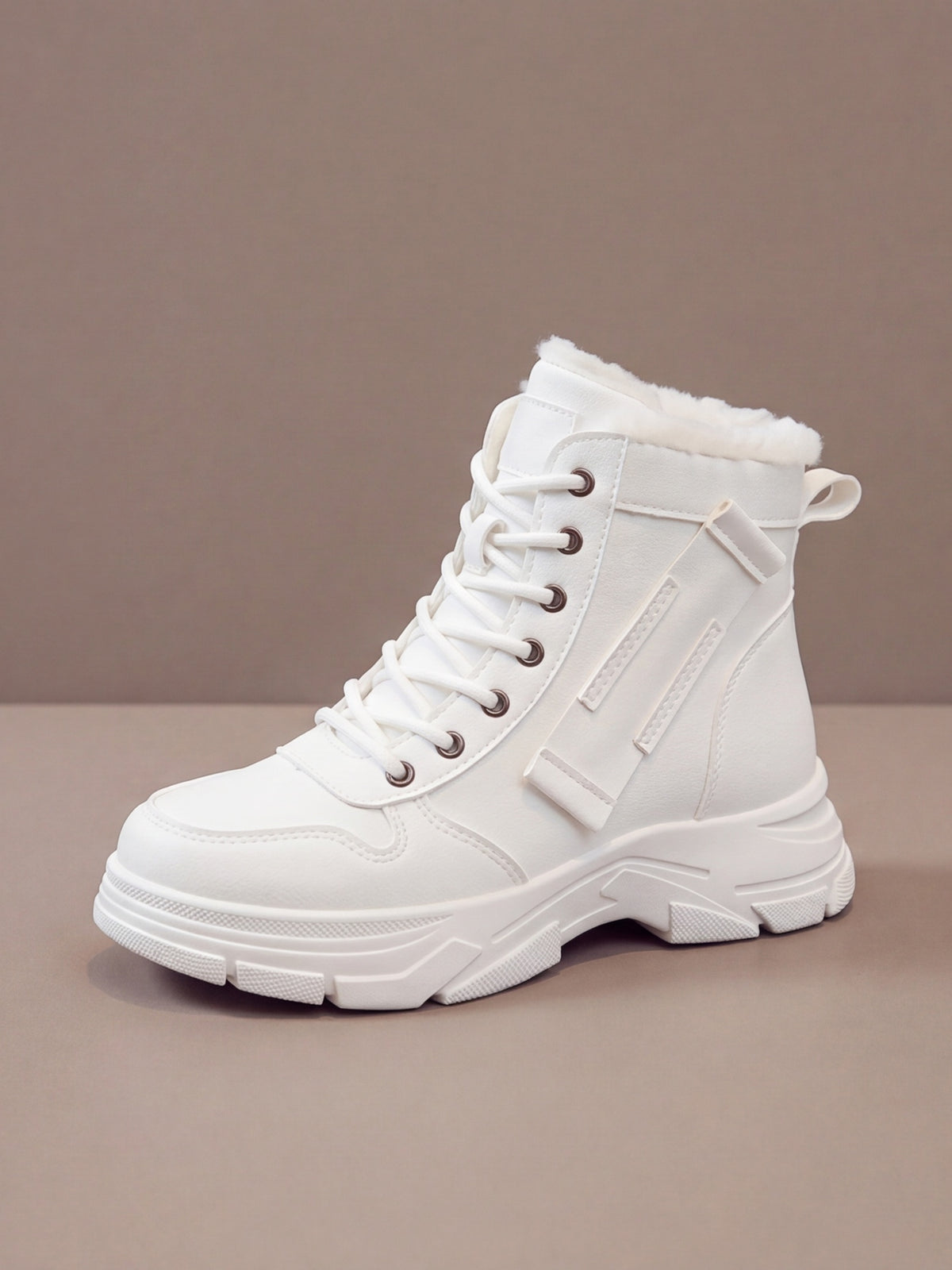 The Plush Boot Women in white, studio