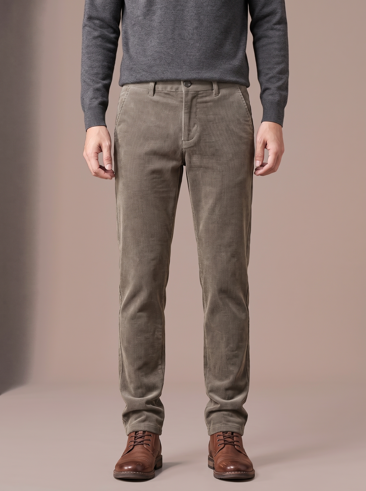 Men's khaki plush-lined corduroy trousers, studio view