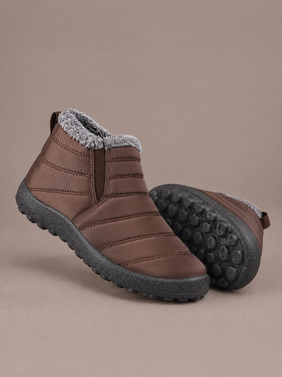 The Quilted Slip-On Women in Brown, with the rubber sole