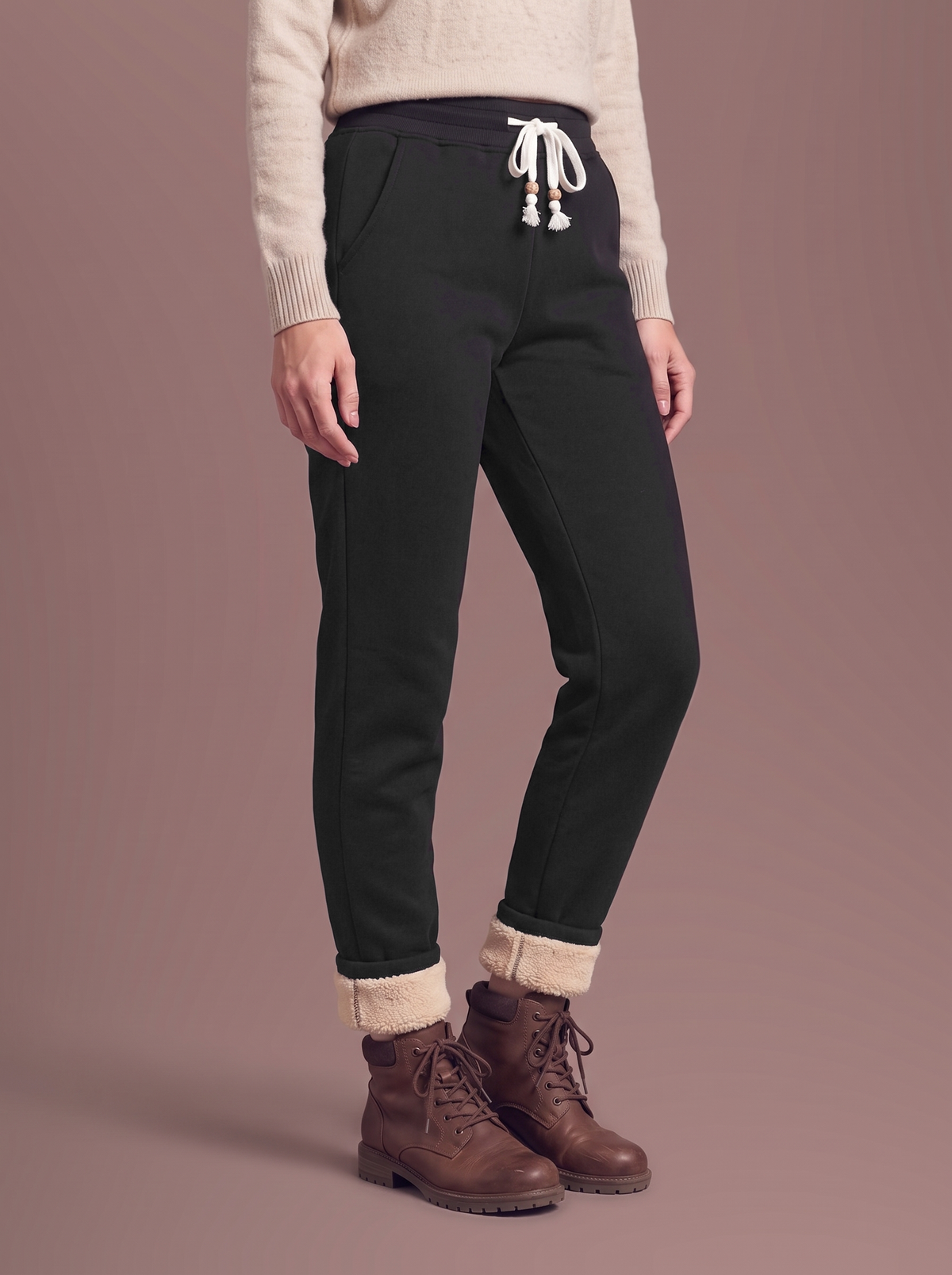 Women's black sherpa-lined joggers, quarter turn