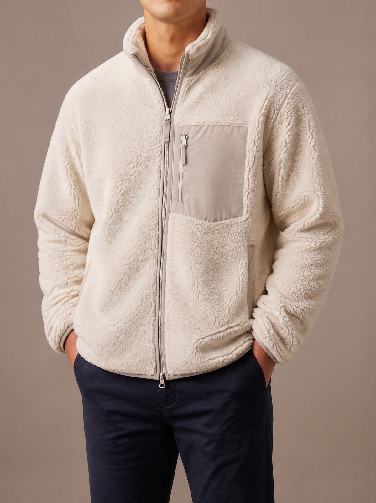 Beige teddy fleece jacket for men with taupe woven chest pocket, studio view