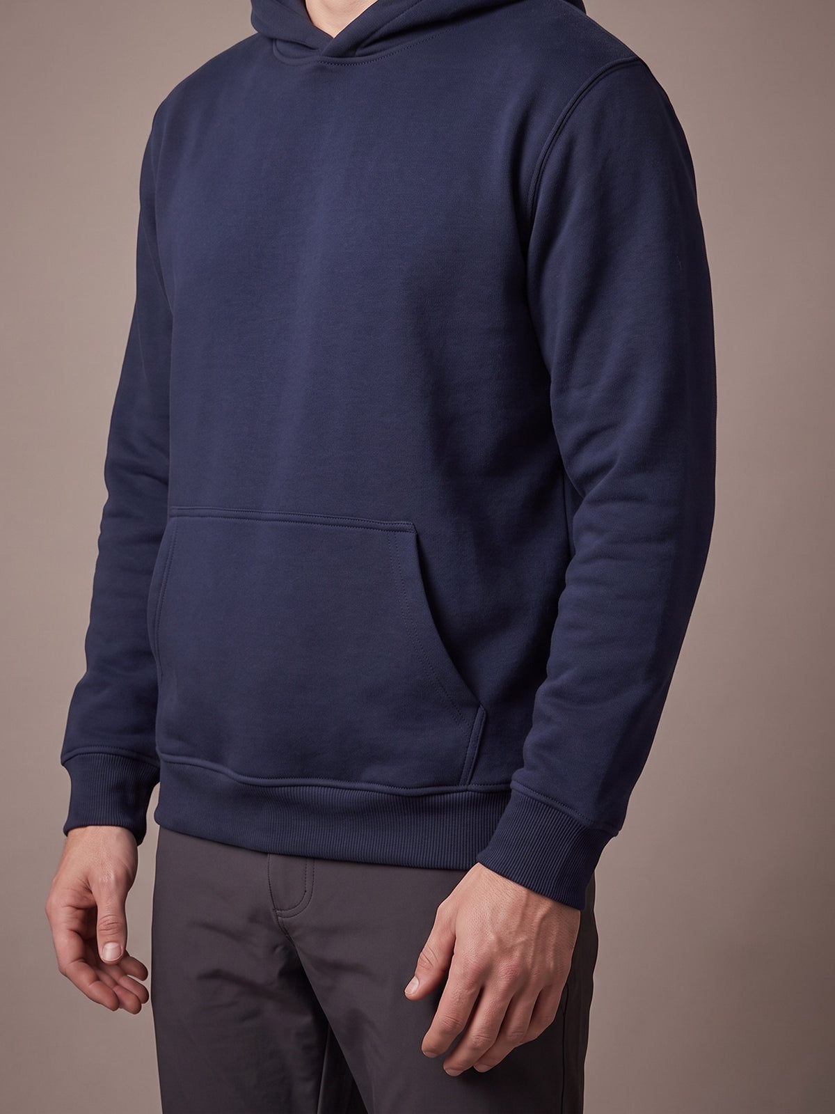 The Fleece Hoodie in navy blue, pullover with hood and kangaroo pocket