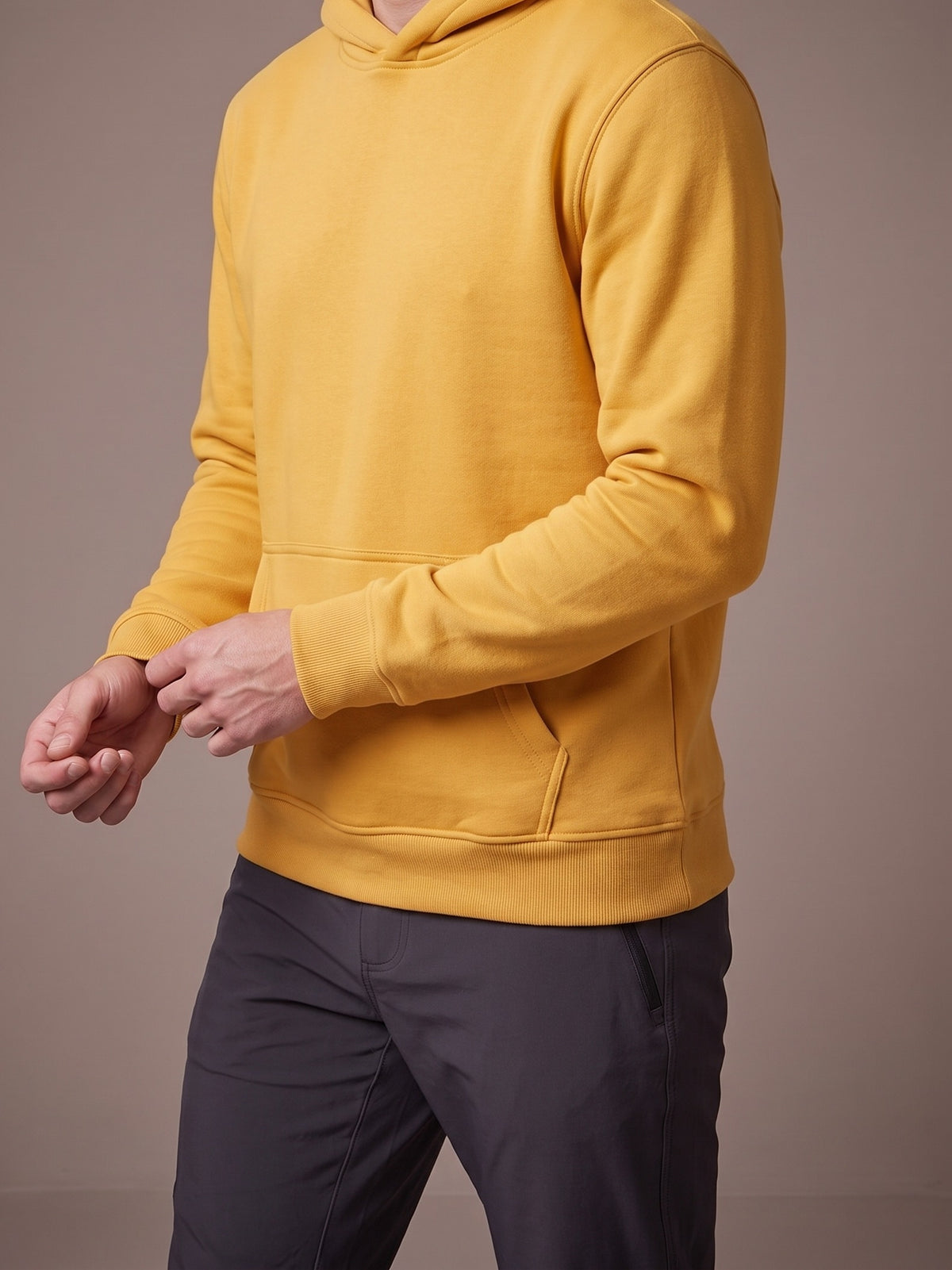 The Fleece Hoodie in yellow, pullover with hood and kangaroo pocket